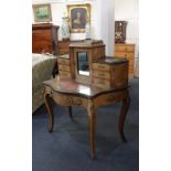 A French walnut bonheur de jour desk, the galleried super structure with central mirror door flanked