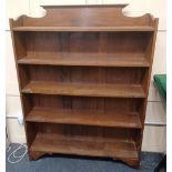 An oak open bookcase with five shelves on bracket feet 91.5cm
