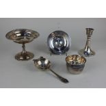 A George V silver pedestal bonbon dish Birmingham 1924 13cm, a George VI silver tea strainer and