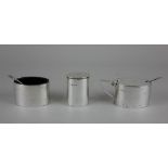 A George VI silver three piece cruet set plain oval form to include mustard pot and salt with blue