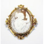 An oval shell cameo brooch in unmarked gold coloured frame cameo 4.5cm by 3.5cm