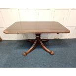 A 19th century mahogany breakfast table the rectangular crossbanded tilt top with rounded corners on