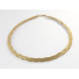 An 18ct gold necklace with plaited design, marked '750', 38.5g