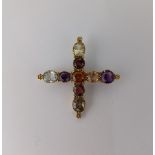 A multi gem set cruciform brooch