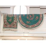 Two Chinese rugs, green ground with pink floral decoration, one circular 122cm diameter, and one