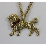 A 15ct gold dog pendant with gem set collar 3.9g gross, on a 9ct gold neck chain chain 10.8g