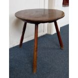 A rustic oak circular table with three splayed legs (on with ring turning) 56cm