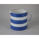 A T G Green & Co Cornish Kitchen ware blue and white striped jug 12cm high (a/f)