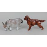 A Lladro figure of a donkey 11cm high, together with a Royal Doulton figure of a red setter 14cm