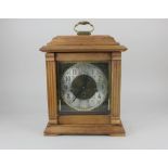 A reproduction bracket clock by Emperor Clock Company with assemby instructions, 38cm