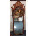 A 19th century fret cut wall mirror with shell carved surmount above a floral painted panel and