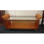 A G Plan teak rectangular coffee table with glass top flanked by sledge ends, on chrome castors 51cm