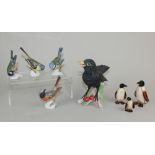 A large Goebel porcelain model of a blackbird 15cm high, together with seven small Goebel