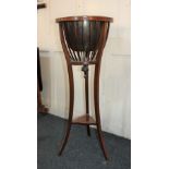 An Edwardian inlaid jardiniere stand with slatted sides and metal liner, on three curved legs 92.5cm