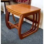 A Parker Knoll vintage teak nest of three occasional tables 52cm wide, 48cm depth