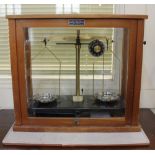 A set of Griffin and George microid chain dial measuring scales in glazed case, together with a