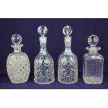 A pair of Victorian cut glass club shaped decanters with stoppers 29.5cm high including stopper,
