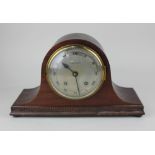 A mahogany domed mantle clock with 14cm dial marked Camerer, Cuss & Co., 37cm
