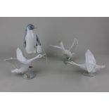 Three Lladro porcelain models of white geese tallest 13cm high, together with a John Jenkins