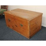 A stained pine trunk with hinged rectangular lid enclosing green painted interior 93cm (a/f)