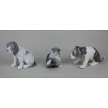 A Lladro porcelain model of a puppy 9cm high and another of a cat with a mouse 8cm high, together