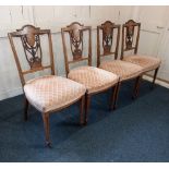 A set of four Sheraton style inlaid rosewood drawing room chairs pierced arched backs with ornate