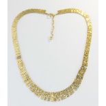 An Amerik gilt metal fringe necklace