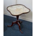 A glazed embroidery tilt-top occasional table on baluster stem and tripod base, (a/f) adapted from a