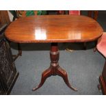A 19th century mahogany tilt top occasional table, with turned baluster support on outswept tripod
