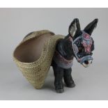 A Lladro gres finish figure of a donkey carrying basket planters 25.5cm high
