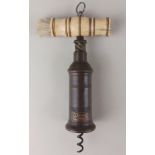 A Thomason type mechanical corkscrew bone handle and bronze barrel with label marked 'Rodgers