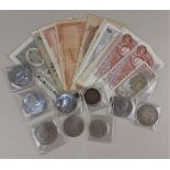 A collection of British and Foreign banknotes including 10 shillings, Middle Eastern and Korean