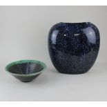 A Poole pottery style blue glazed vase, of flattened ovoid form, no maker's marks 29cm high,