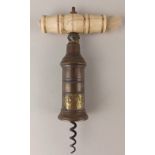 A Thomason type mechanical corkscrew bone handle and bronze barrel with brass label 'A Young 57