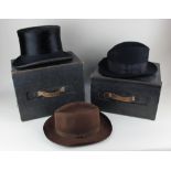 A Henry Heath Ltd silk top hat in original box, together with a Henry Heath black trilby and a Scott