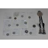 A small collection of William III and later coinage, together with a pair of metal tassel shaped