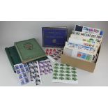 Three albums of British and international stamps (part full), and some loose, together with a