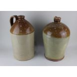 Two large stoneware flagons, to include a 9 gallon flagon with raised plaque 'I, Gunson Wainfleet'