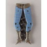 A German ladies legs novelty pocket corkscrew bright blue stockings and wire worm see Ferd Peters
