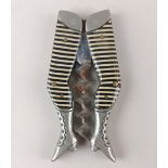 A German novelty ladies legs pocket corkscrew brown and cream striped stocking with bladed worm,