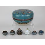 A collection of turquoise ground cloisonne comprising a circular box and cover, snuff bottle and two