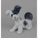 A Lladro porcelain figure of a dog 15.5cm high