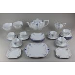 A Shelley porcelain Queen Anne Blue Iris pattern part tea service comprising teapot, milk jug, two