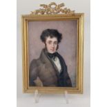 A 19th century portrait miniature of a gentleman, half length, signed and dated J H Jones 1831, on