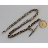 A Victorian fancy link watch chain with a 9ct gold mounted 1913 half sovereign fob, and a yellow