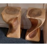 A pair of rustic carved wood stools with square top over twisted body on square base width 27.5cm,