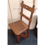 A Victorian oak Gothic style metamorphic chair / library steps, with pierced bar back, and four