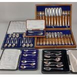 A cased canteen of twelve pairs of silver plated fish knives and forks together with a cased set