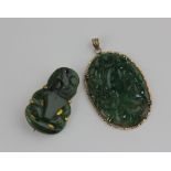 A New Zealand nephrite brooch designed as a tiki, verso inscribed 'kia ora. Jean ake, ake, ake. G.