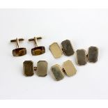 Three pairs of 9ct gold cuff-links, all of shaped rectangular form, two with chain connectors and